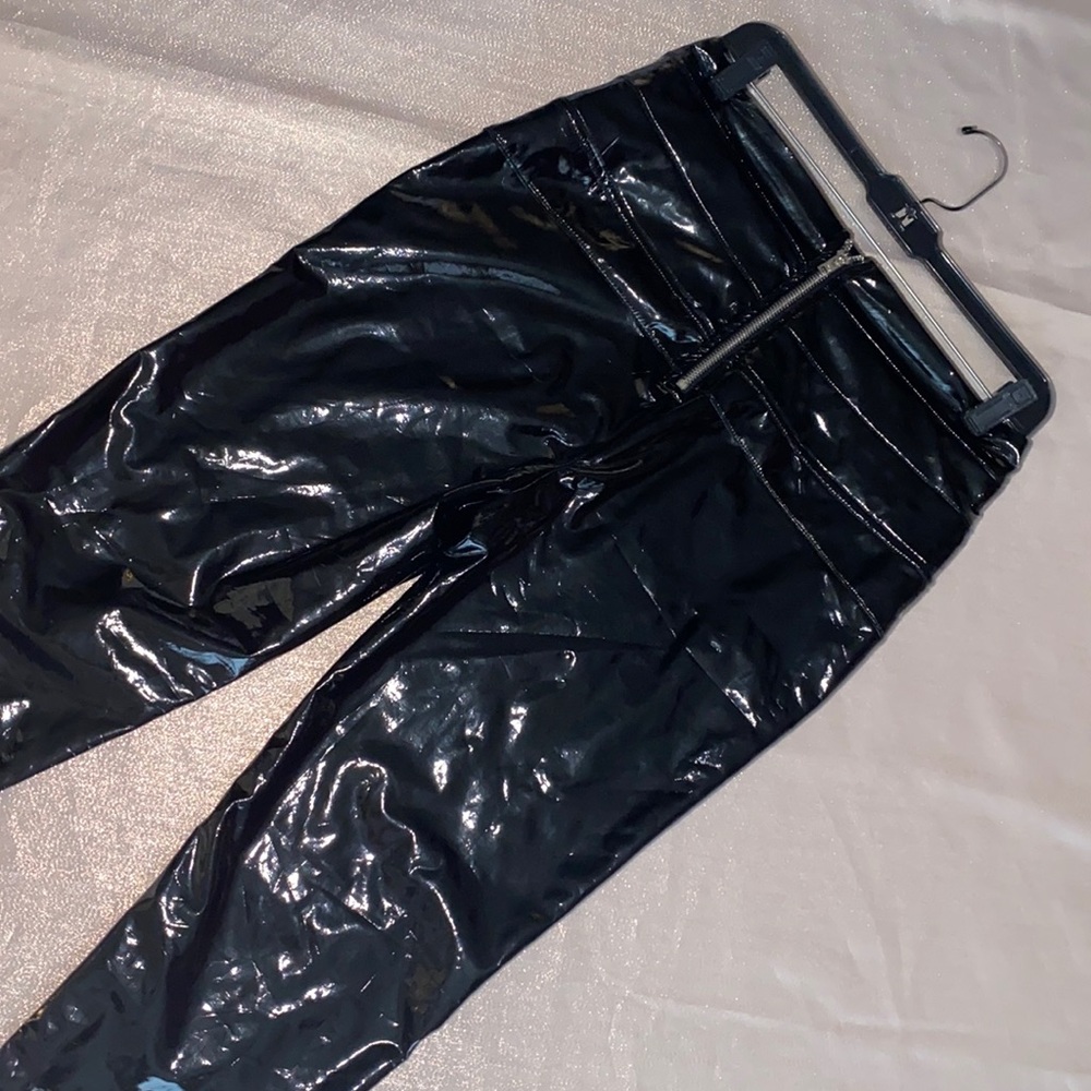 NEW Bebe black high-waisted latex leggings.